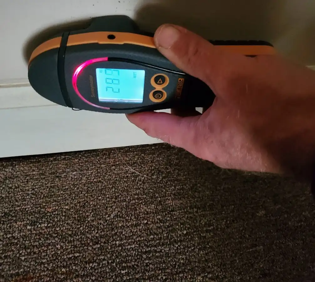 Moisture detection at baseboard during Burst Pipe Cleanup in Chelmsford